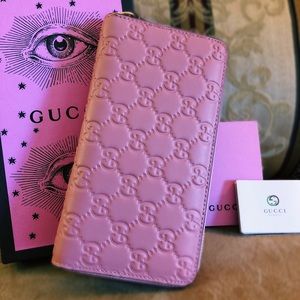 Gucci pink zip up wallet